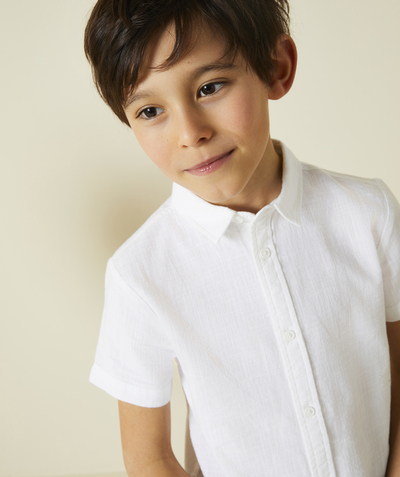   - white organic cotton boy's short-sleeved shirt