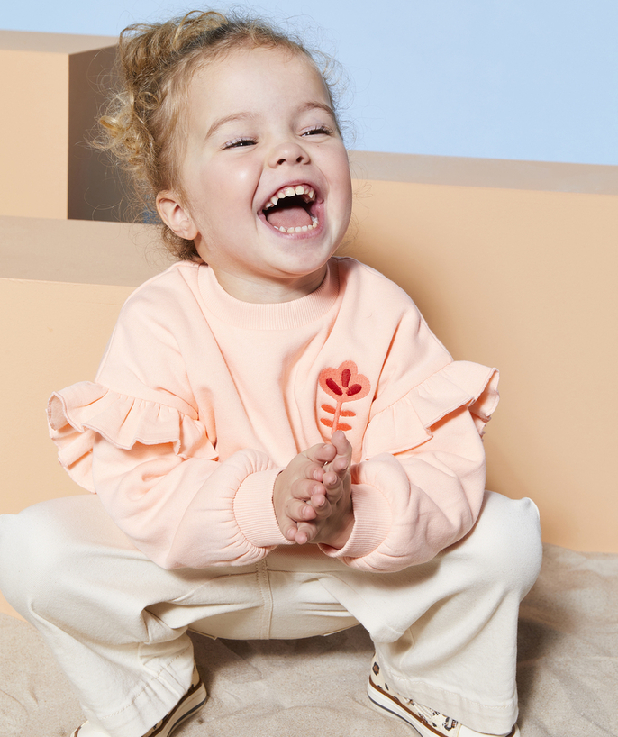 Mała dziewczynka Kategorie TAO - Bluza dla dziewczynki w kolorze pomarańczowym z włókien pochodzących z recyklingu, z falbankami i haftowanym kwiatkiem