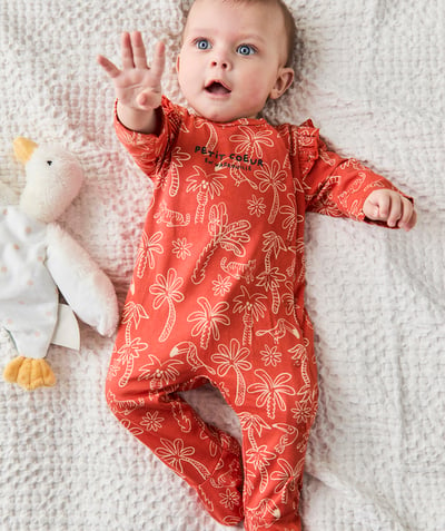 Newborn Tao Categories - baby sleeping bag in rust-colored organic cotton with palm tree and bird print