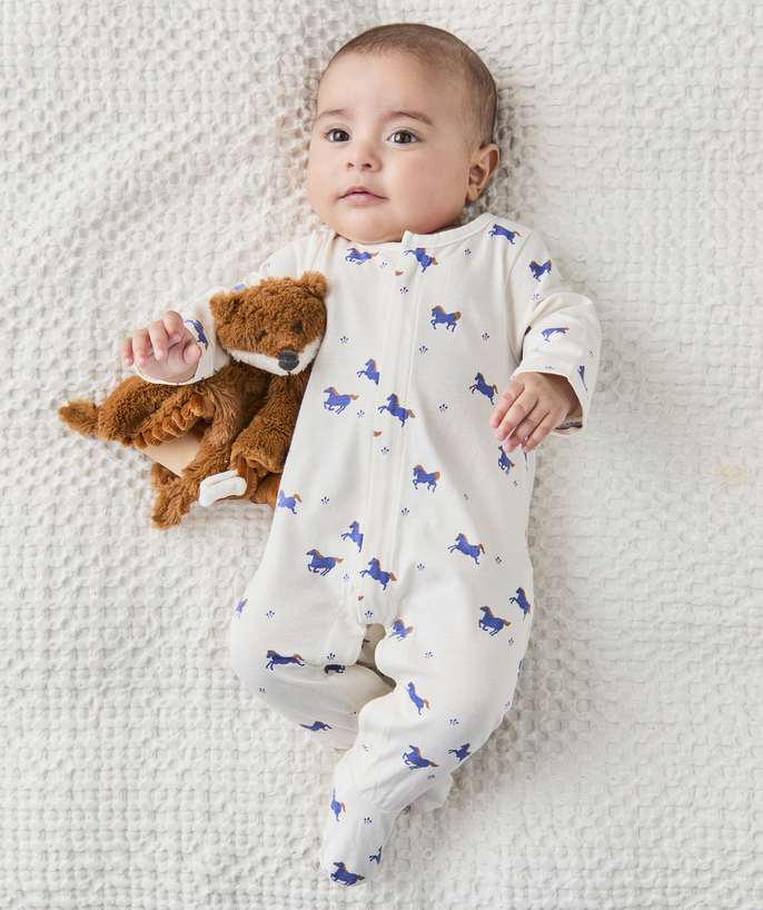 Pyjama Tao Categorieën - Ecru katoenen babyslaapzak met paardenprint