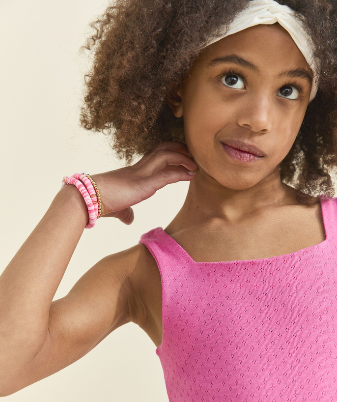 Dziewczynka Kategorie TAO - Ażurowa koszulka dziewczęca z bawełny organicznej i różową kokardką