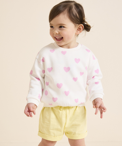 ECODESIGN Collectie Tao Categorieën - korte broek voor babymeisjes in geel biokatoen met manchetten