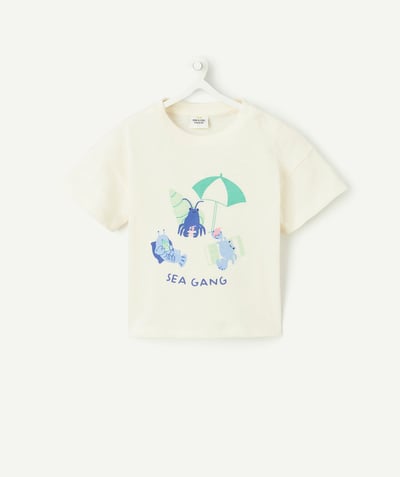 ECODESIGN Kategorie TAO - Koszulka chłopięca z krótkim rękawem z bawełny organicznej w kolorze ecru z motywem krabów i parasoli