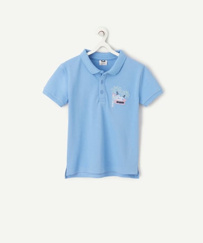 Koszule - Koszulki Polo Kategorie TAO - chłopięca niebieska koszulka polo z krótkim rękawem i wzorem Miami