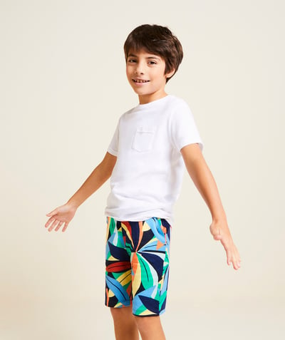 Bermudas - pantalones cortos Categorías TAO - Bermudas para niño en algodón orgánico azul marino con colorido estampado tropical