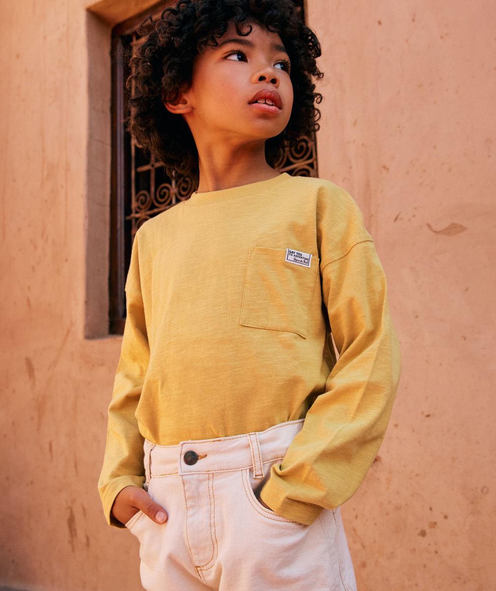 T-shirt manches longues garçon en coton bio jaune avec poche sur le coeur - 12 A